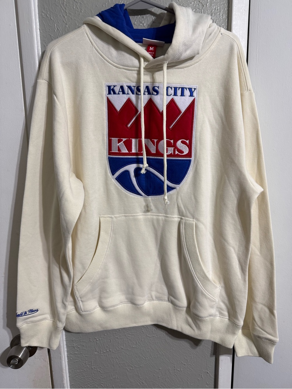 Mitchell & Ness Cream Hoodie with Red & Blue Kansas City Kings Crest